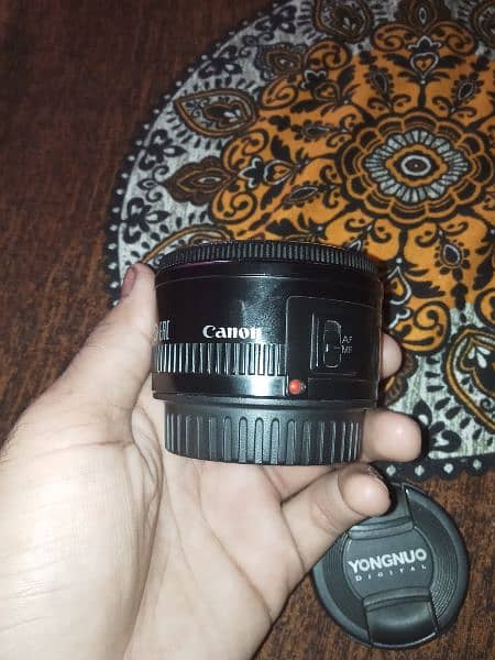 Canon 60d with box And 50mm canon lense 8