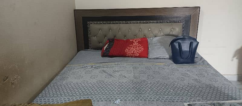 King-size bed with spring mattress 2