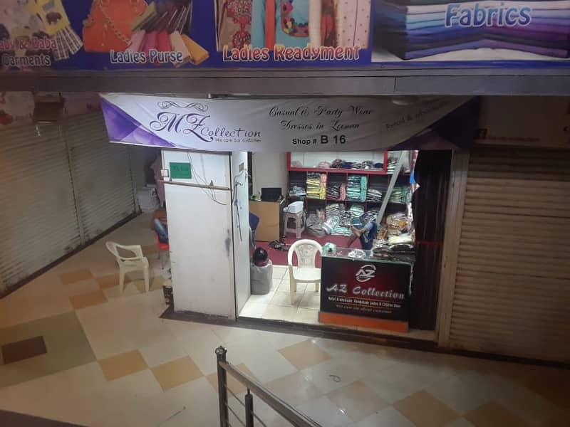Corner Shop In Shopping Plaza In Old City Near Ranchor Line And Jama Cloth. 1