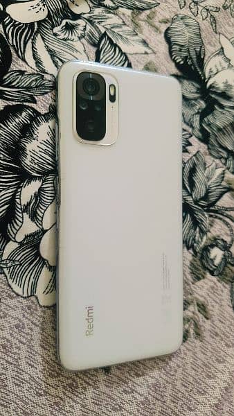 redmi note 10 6 128 gb box charger k sath 0