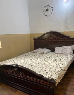 Bed set in black wooden with 2 side tables and one dressing table.