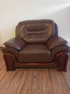Brown leather brand new sofa and black leather sofa