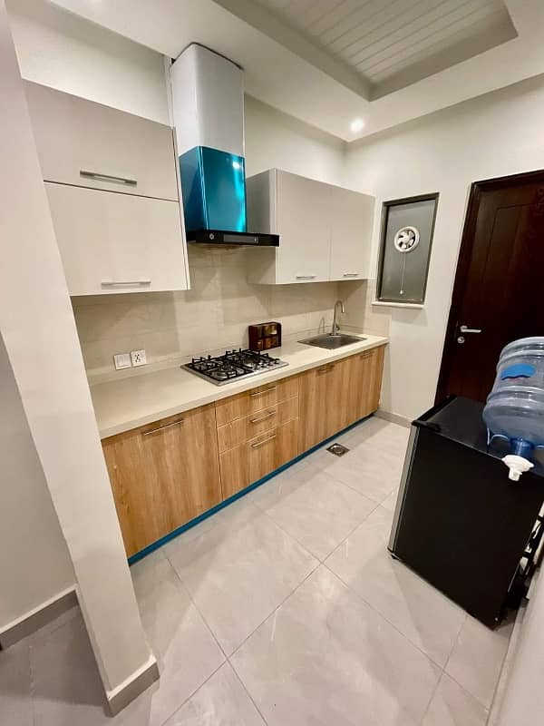 E11 2 bedroom fully furnished apartment available for rent 12