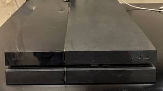 PS4 with 1 controller & 2 games