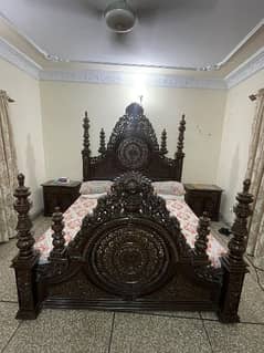 carved luxury bed