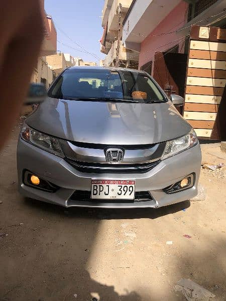 I am selling my car Honda Grace hybrid 2015 registration 2018 in Sindh 11