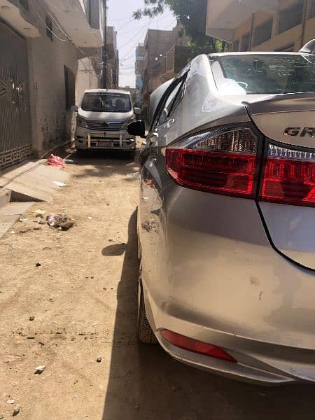 I am selling my car Honda Grace hybrid 2015 registration 2019 in Sindh 19