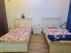 pair of single beds for sale