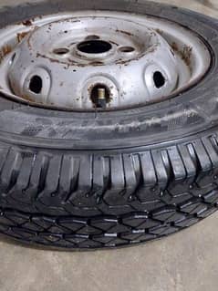 unused Alto tyre with rim - stapny