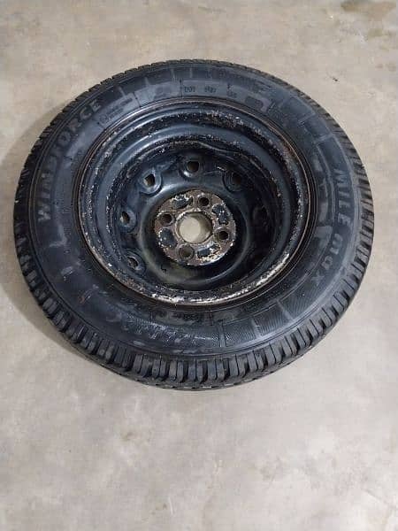 unused Alto tyre with rim - stapny 1