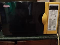 Working condition CHEF microwave oven with cooking and baking options.