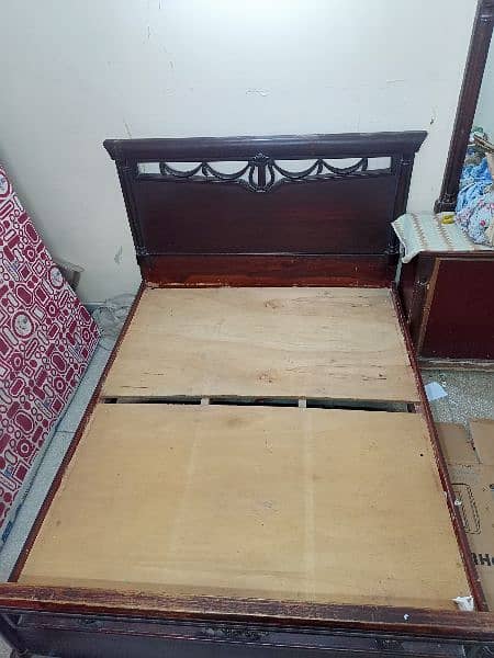 Wooden double bed with Mattress 12