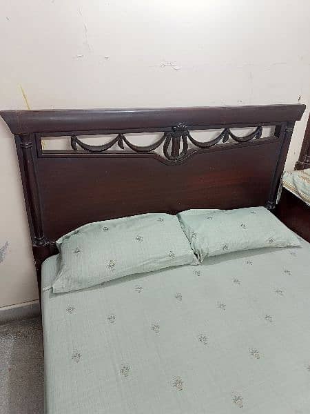 Wooden double bed with Mattress 6