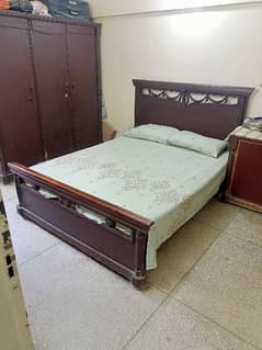 Wooden double bed with Mattress