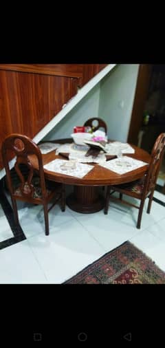 Round wooden dinning table with 5 chairs