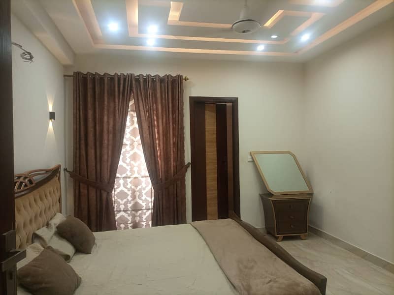 2 bed furnished flat. Available for rent faisal town 4