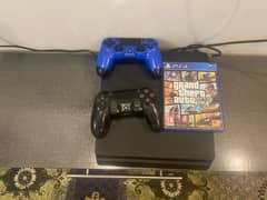 ps4 for sale with 2 controllers and a cd gta 5