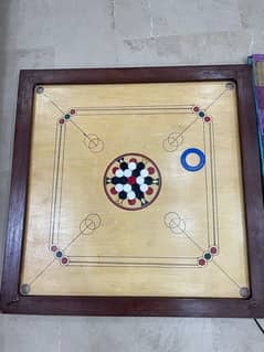 new condition with full pair of slots and carrom striker
