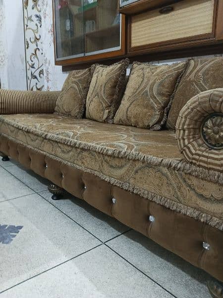 7 seater sofa set with 8 cushion 2 round cushions 9