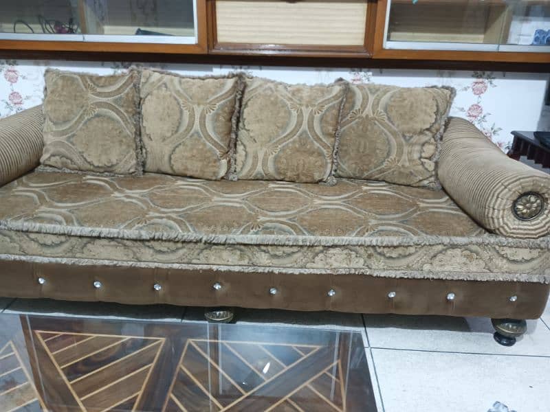 7 seater sofa set with 8 cushion 2 round cushions 10