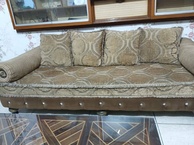 7 seater sofa set with 8 cushion 2 round cushions 11