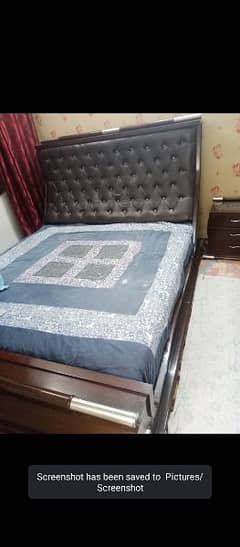 double bed with 2 side table