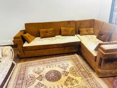 brown and beige L shaped corner sofa