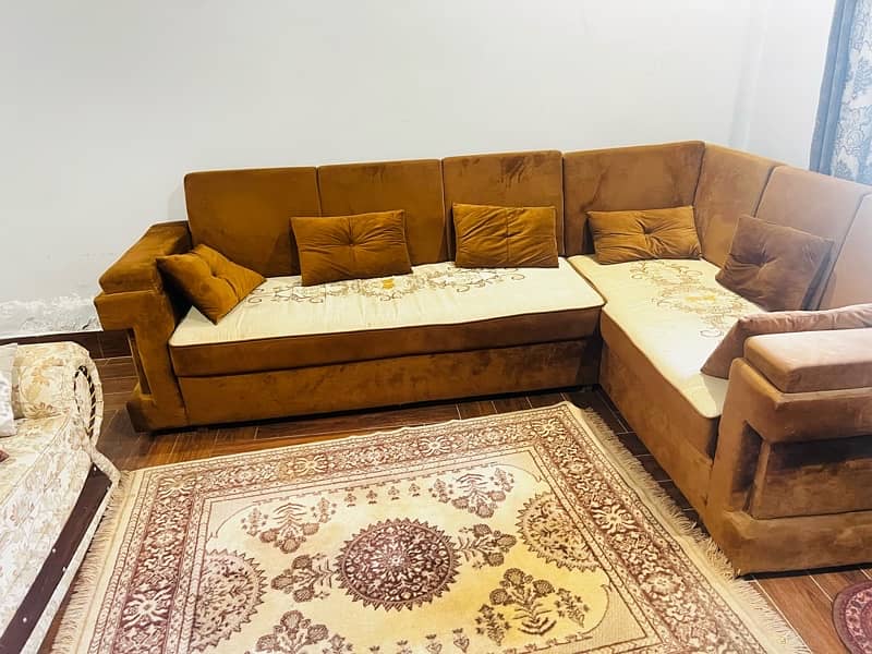 brown and beige L shaped corner sofa 0