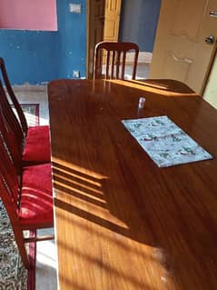 A Dinning Table For Sale With 6 Chairs. . .