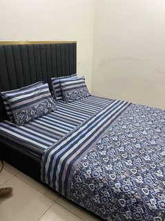 bed with 2 chairs