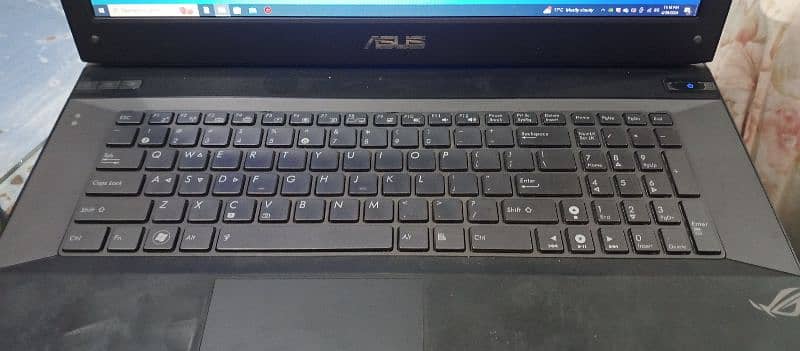 i am selling Asus laptop fully working i am planning GTA 5 0