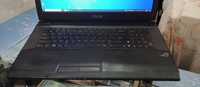 i am selling Asus laptop fully working i am planning GTA 5 1