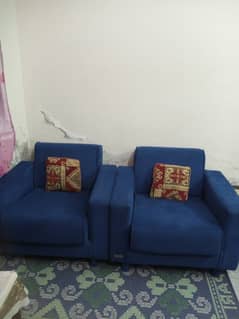 two single seat sofa