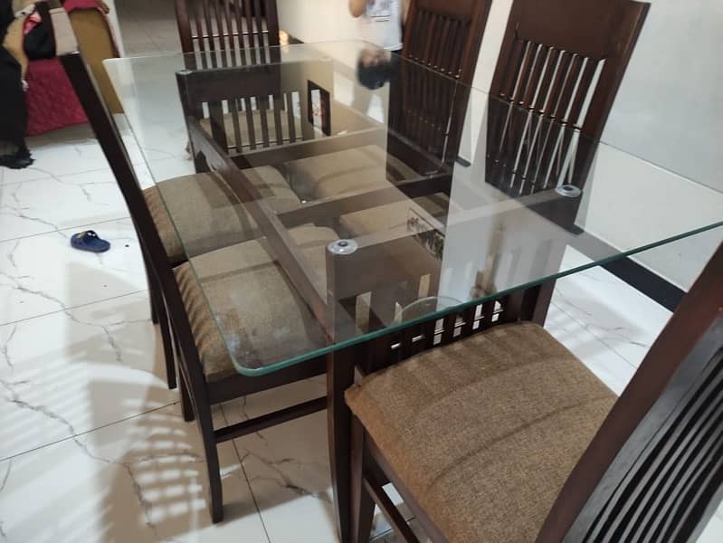 two sets of dinning tables with 6 chairs & three set Center for sale 1