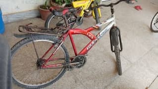 Mountain Bikes Good Condition Imported red and yellow.