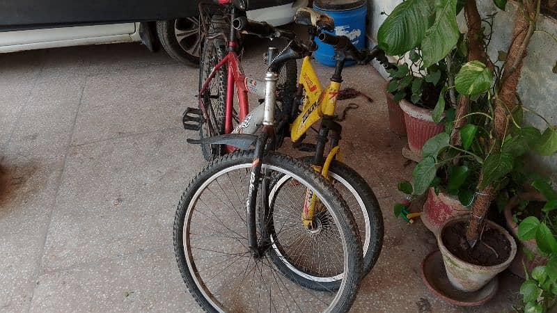 Mountain Bikes Good Condition Imported red and yellow. 7