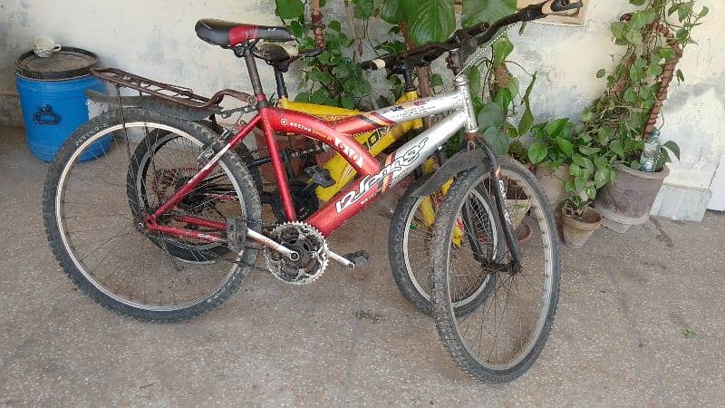 Mountain Bikes Good Condition Imported red and yellow. 8