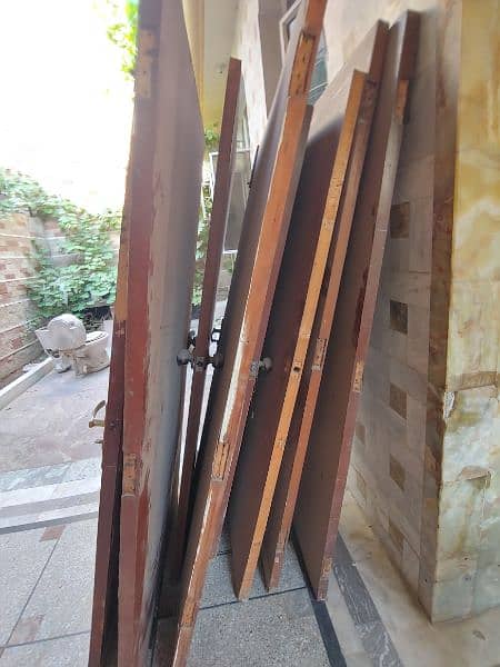 wooden doors and wash basen and commode 0