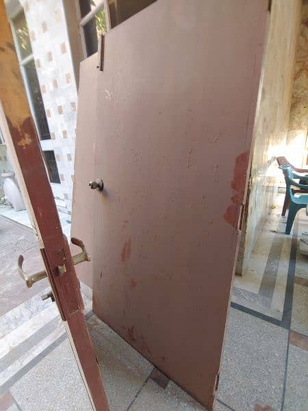 wooden doors and wash basen and commode 9