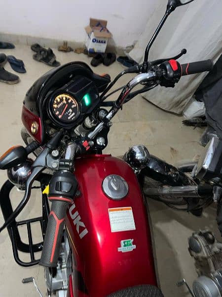 Suzuki 110 red colour new condition 1