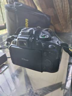 Nikon D5200 & Tripod: excellent to start photography