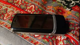 Motorola's flip phone with charger 0