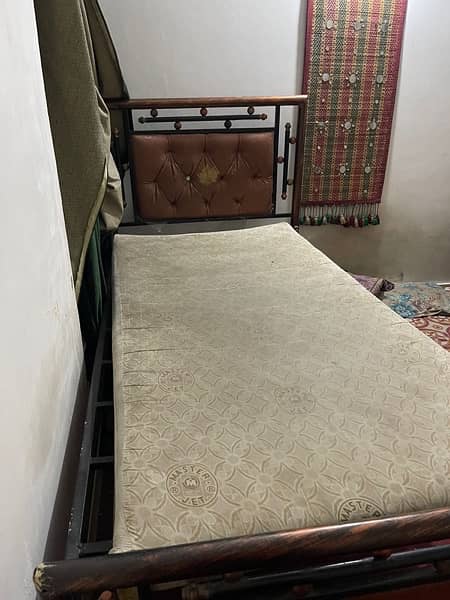 single iron bed 1