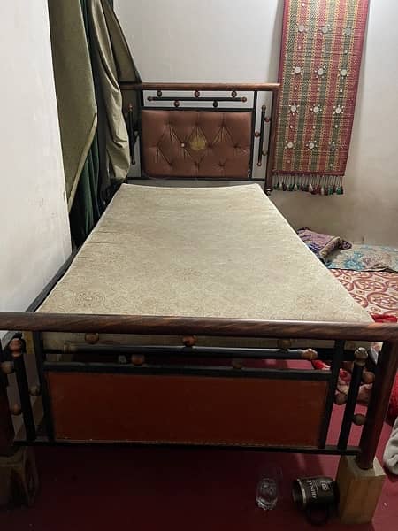 single iron bed 2
