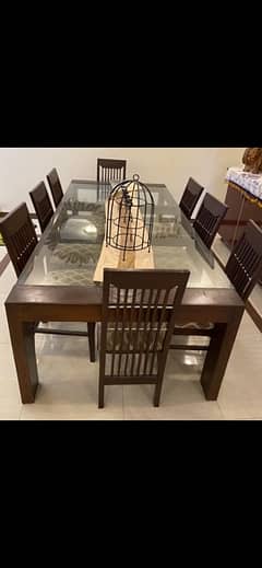 pure wooden 8 seater dining table