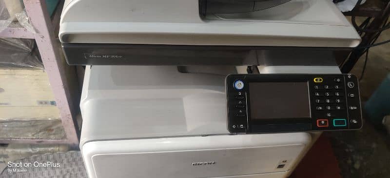 Ricoh mp 301 printers 4 in 1   my contacts number 03073701992 2