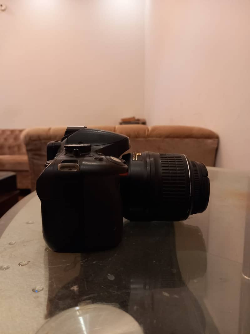 Nikon D5100 with 18/55 mm lens 2
