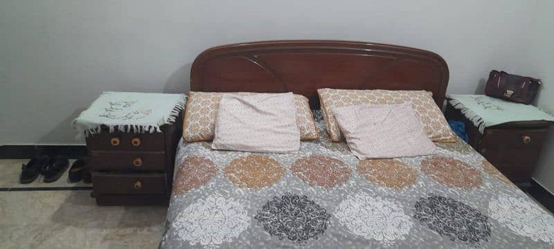Bed with side table 0