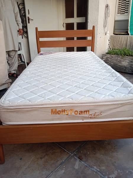 wooden single bed with side table and mattress 3