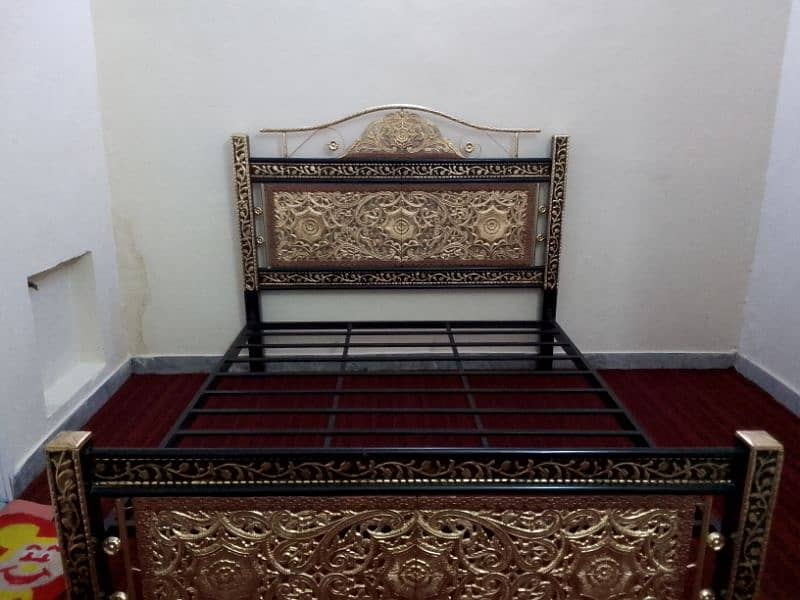 Rod iron bed 1